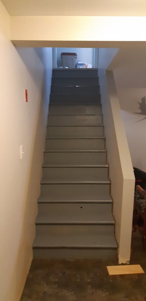 steep stairs without railing found at an inspection